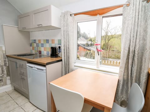 Fridge, electric kettle, toaster, cookware/dishes/utensils