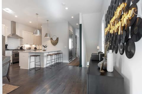 Vinyl wall accents give the living room character.