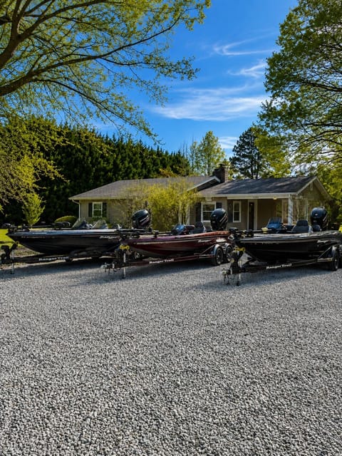 Bring the whole crew and all the boats! This oversized gravel driveway offers plenty of room for multiple boats, trailers, trucks, and vehicles, making it the perfect home base for tournament anglers, fishing groups, and Lake Norman adventures.