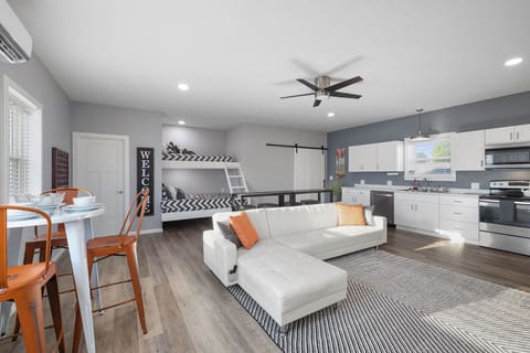 The spacious open concept bedroom and kitchen also features a built in bunk bed.