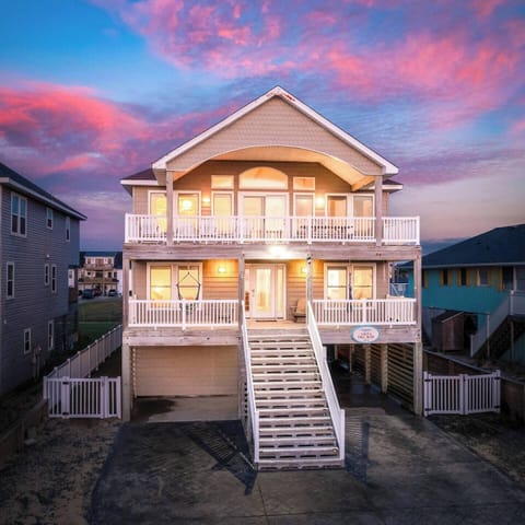 Welcoming front outdoor space—perfect for morning coffee, evening chats, and soaking in the coastal breeze.