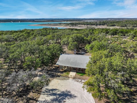 Aerial view of home showing beautiful Canyon Lake in the background.
