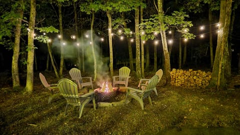 Firepit With Adirondack Chair Seating and LED Lighting
