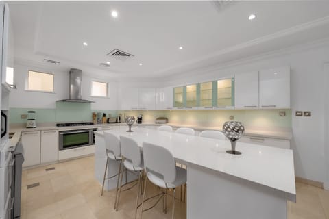 Deluxe Villa, 5 Bedrooms | Private kitchen | Dining tables