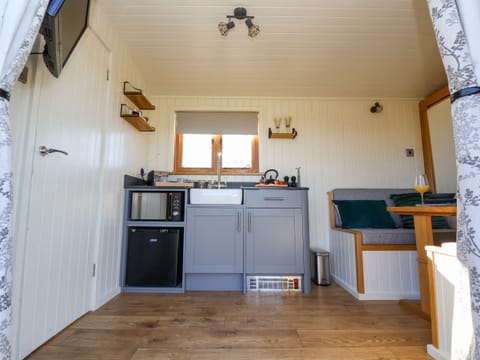 Fridge, electric kettle, toaster, cookware/dishes/utensils