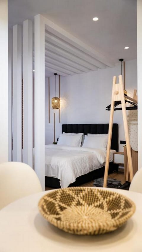 Junior Suite | Living area | 50-inch Smart TV with digital channels, TV, Netflix