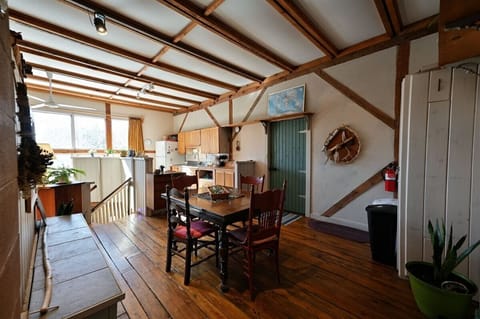 Kitchen and Dining Area lead right out to the Seasonal Screen porch for easy access.