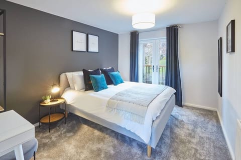 The master bedroom boasts a king-size bed
