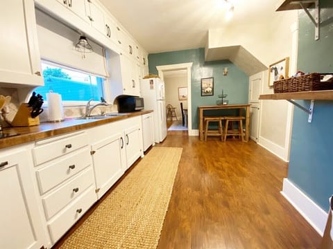 Enjoy a galley kitchen off the back of the house!