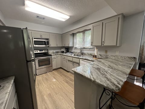 Condo, 2 Bedrooms | Private kitchen | Fridge, oven, coffee/tea maker