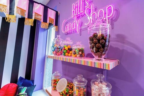 A pure imagination moment at Bill's Candy Shop. This Willy Wonka inspired display is stocked with candy for show only, adding a little whimsy to your stay.