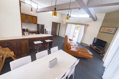Villa | Living area | 59-inch flat-screen TV with digital channels, TV