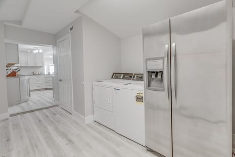 Laundry room extends beyond the kichen