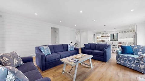 Comfortable open concept living space with nautical decor