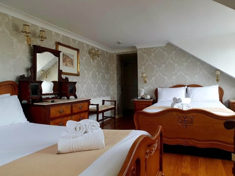 Family Double or Twin Room | Desk, iron/ironing board, free WiFi, bed sheets