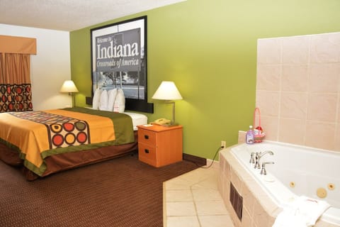 Desk, laptop workspace, blackout drapes, cribs/infant beds