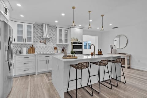 Whip up delightful meals in our brand new fully equipped French-style kitchen with a stunning gold touch faucet.