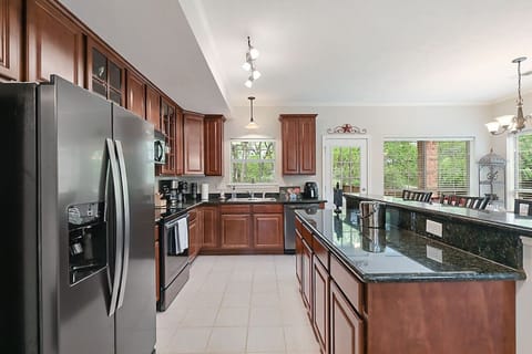 Large kitchen space with granite countertops