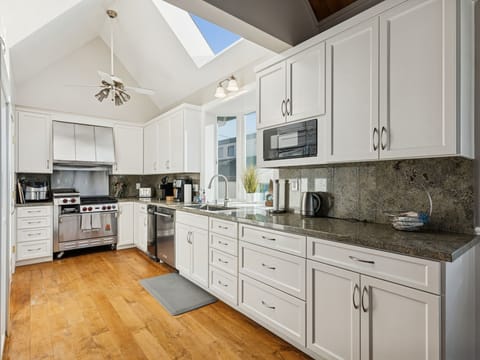 Fully stocked chef's kitchen.