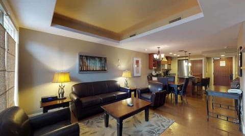 Open concept  living room, dining and kitchen area. 