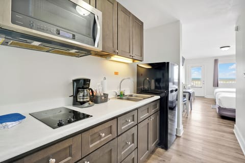 Fridge, microwave, coffee/tea maker, paper towels