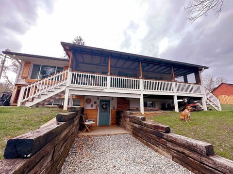 Outside of home - back porch view and entrance to private suites