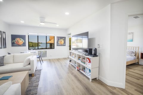 Cozy Living Room with Large Flat Screen SmartTV