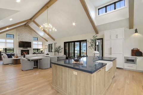 Open concept kitchen, dining and living room.