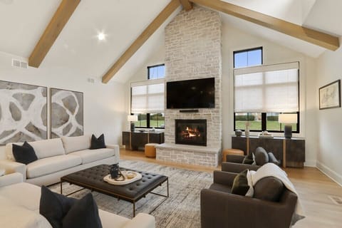 Living Room with gas fireplace and smart TV