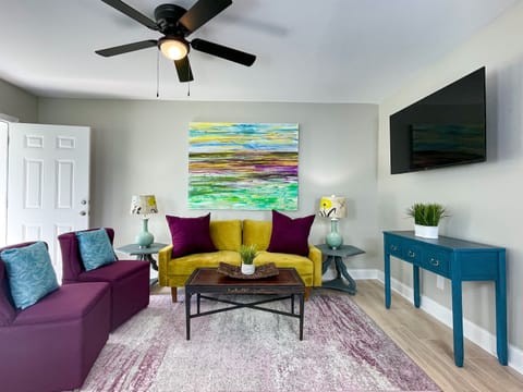 Stream your favorite show on the 55" Smart TV while relaxing on the comfy living room seating