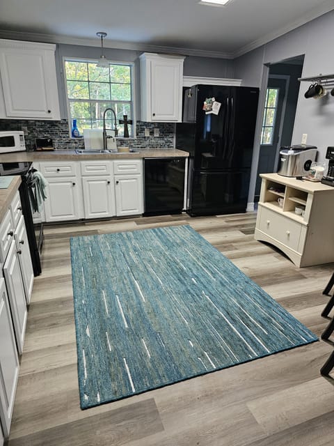 Kitchen, laundry room to the right