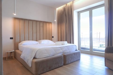 Superior Double or Twin Room | Down comforters, minibar, desk, laptop workspace