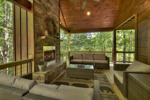 Enjoy the feel of sitting in a treehouse while visiting the Papa Bear Lodge cabin rental in Blue Ridge 