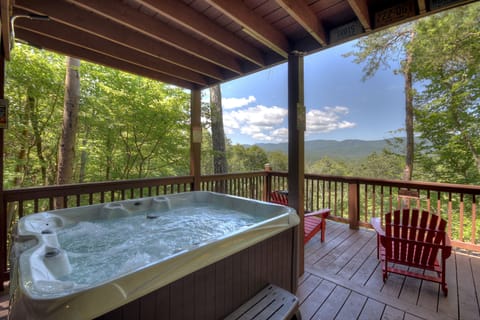 Soak in the Hot Tub With Mountain View at this luxury cabin rental in North Georgia