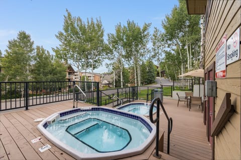 Community Hot Tubs  and BBQ grills surrounded by Aspen Trees