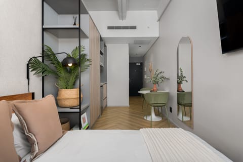 City Studio | Living area | 40-inch flat-screen TV with cable channels, TV, Netflix