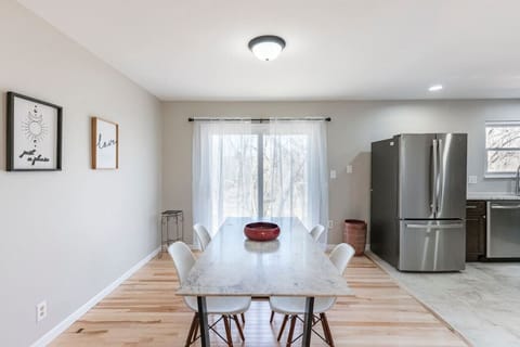 Dinning area , elegant marble table , fridge
