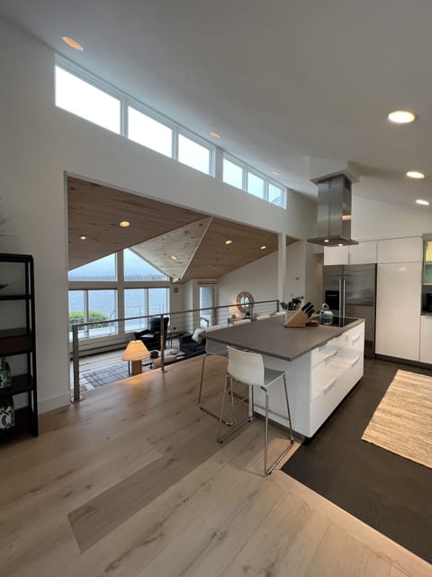View from dining area to kitchen and living room.