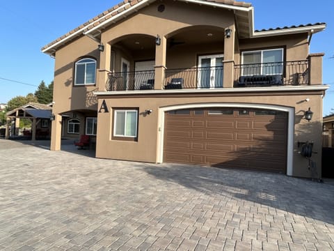 Main house with 4 bedrooms, 3 baths, 2 sleeper sofas and a Murphy bed.  Covered hot tub, BBQs and hibachi grill