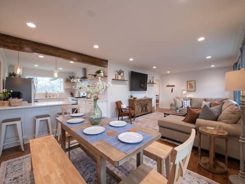 The Crossing House has a newly renovated kitchen, dining, and living room that all flows together.