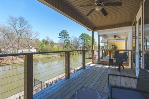Relax on the covered balcony with peaceful water views and plenty of space to unwind.