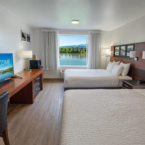 Suite, Multiple Beds, Non Smoking (Upgrade) | Pillowtop beds, in-room safe, individually furnished, blackout drapes