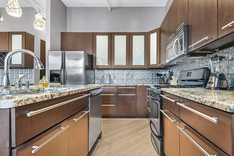 Living Room / Dining Room combo with fully stocked kitchen