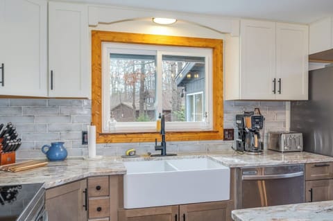 Kitchen window with view of front deck