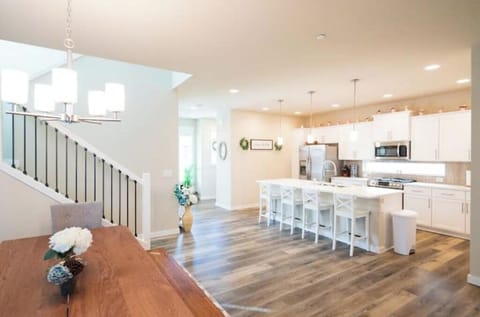 The kitchen has dishwasher, stainless steel sink, full size stove with oven, etc