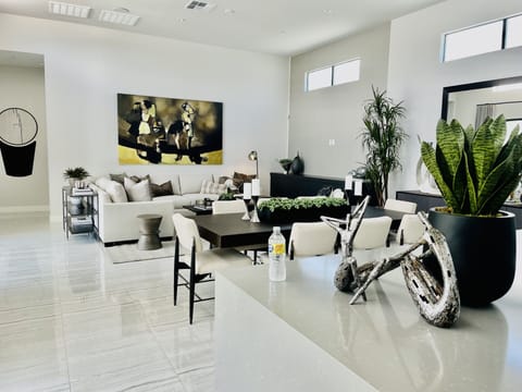 TV room, dining area and kitchen open floor plan