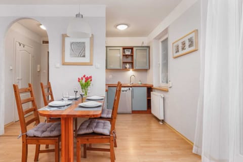 A dining and living area with an open layout, designed for comfort and convenience.