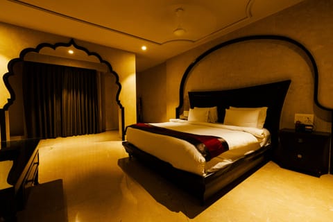 Triple Deluxe Room | Minibar, free WiFi, bed sheets