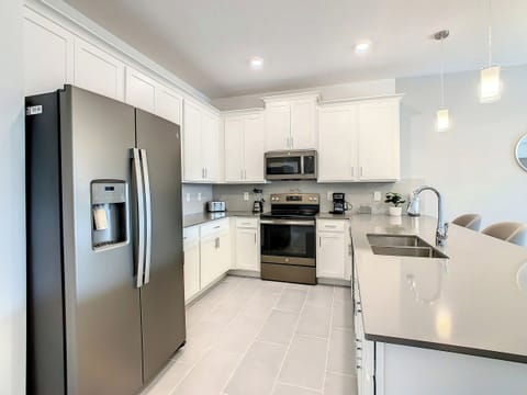Modern Kitchen with Stainless Steel Appliances and Island
