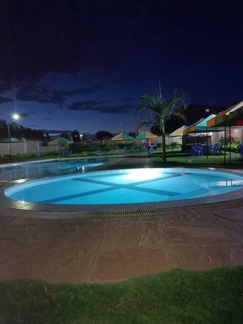 Outdoor pool, sun loungers, lifeguards on site